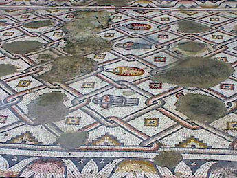 The church's Mosasic floor depicts baskets and fish fins.